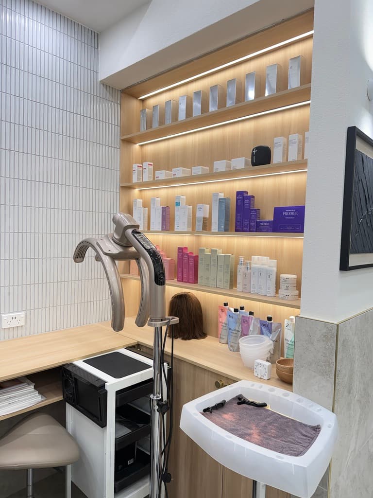 Mend Beauty Studio product shelves and professional hair care station